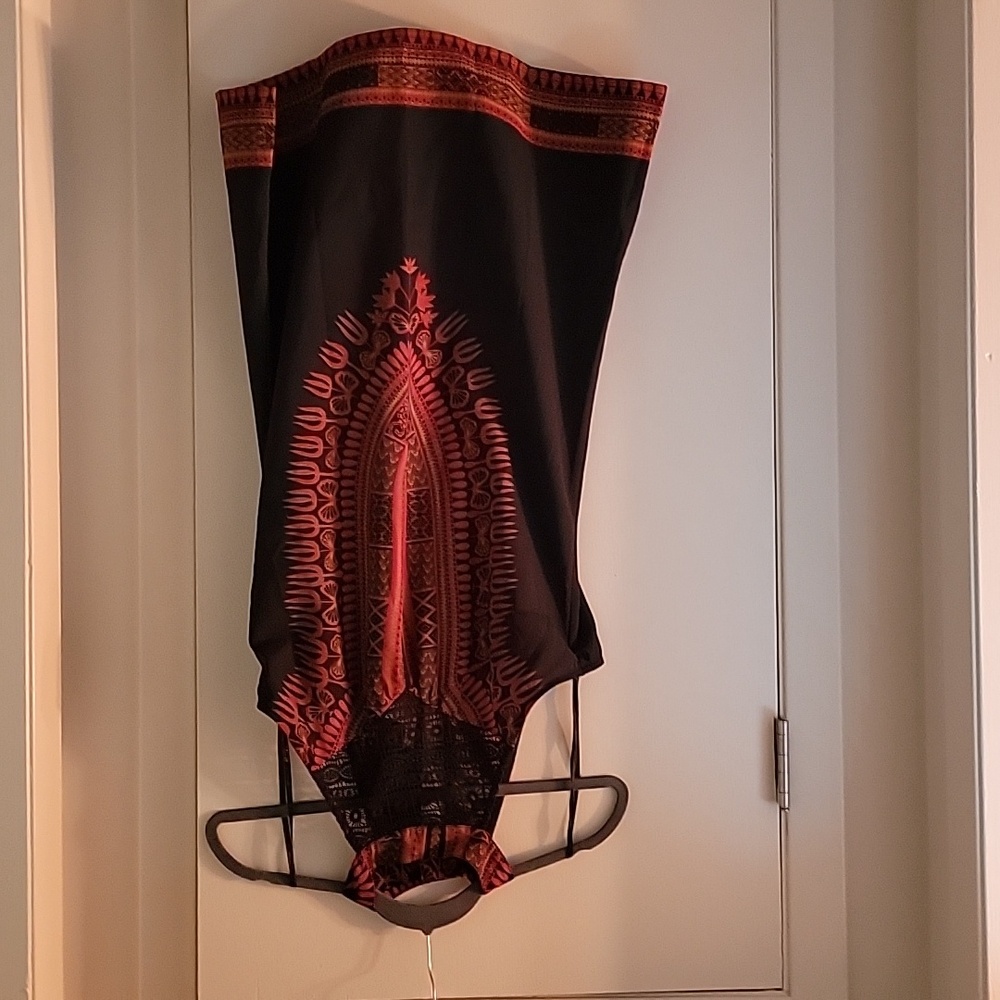 Cute 100% polyester dress.